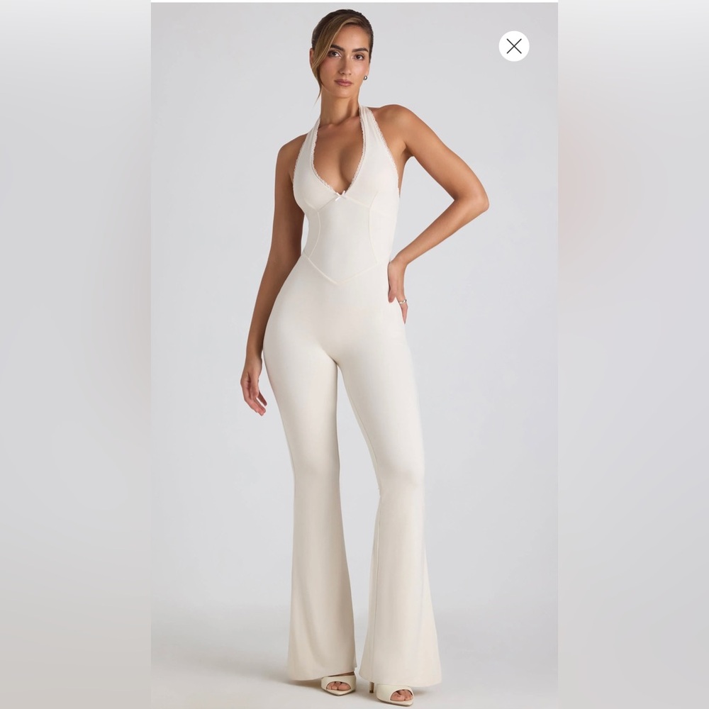 NEW (WITH TAGS) OH POLLY MODAL LACE-TRIM CUT-OUT FLARED JUMPSUIT IN IVORY